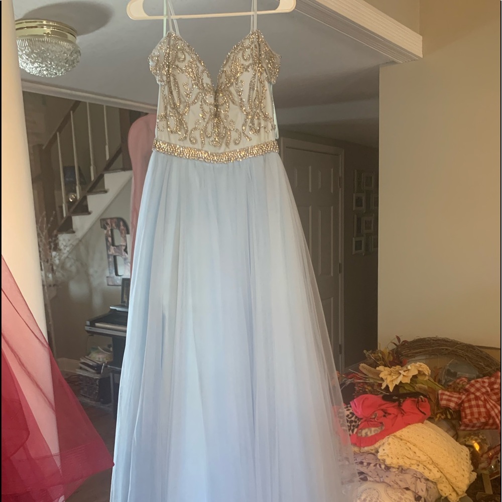 Brand new size 6 pastel blue prom dress